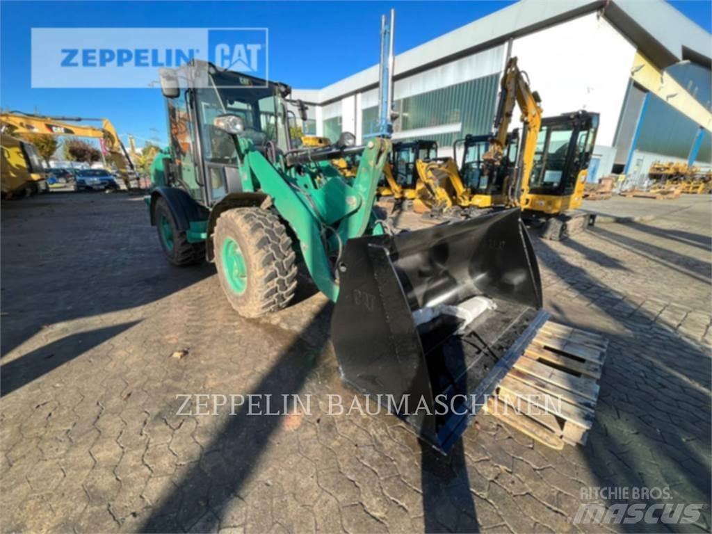 CAT 906M Iekrāvēji uz riteņiem