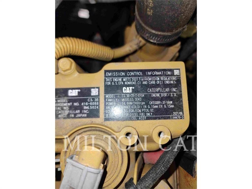CAT 906M Iekrāvēji uz riteņiem