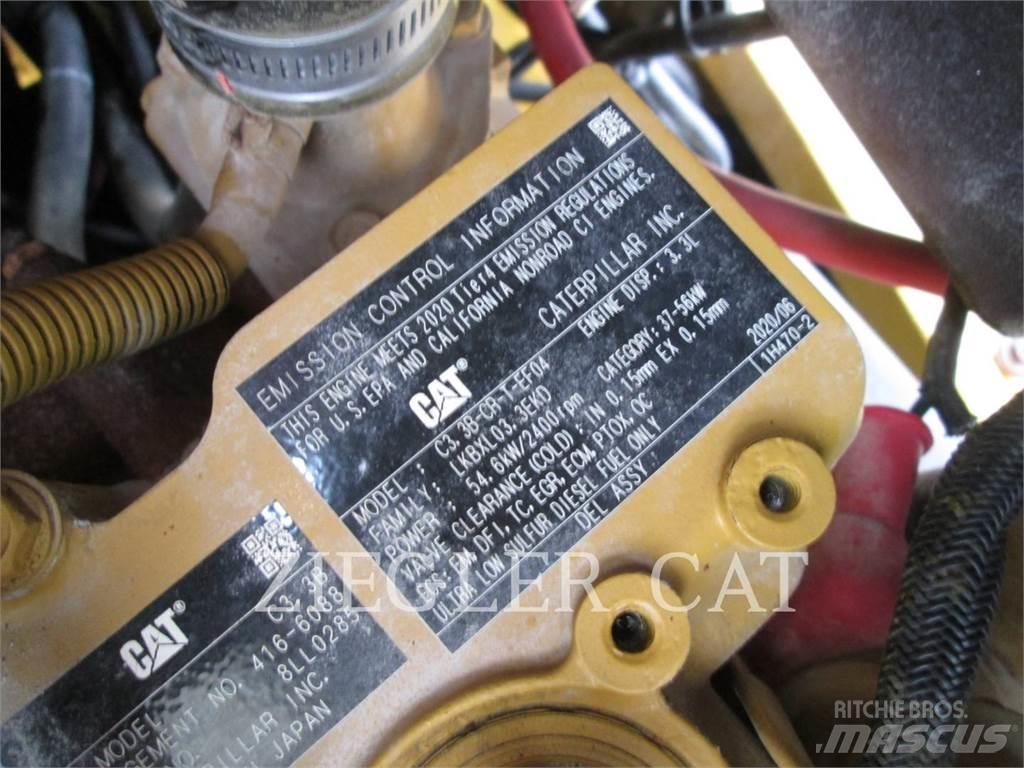 CAT 906M Iekrāvēji uz riteņiem