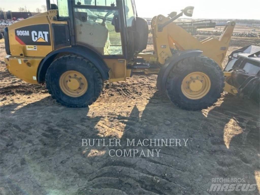 CAT 906M Iekrāvēji uz riteņiem