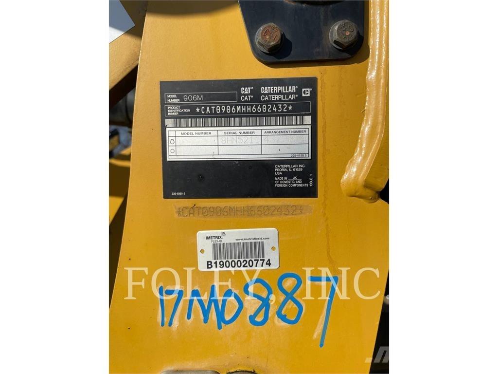 CAT 906M Iekrāvēji uz riteņiem
