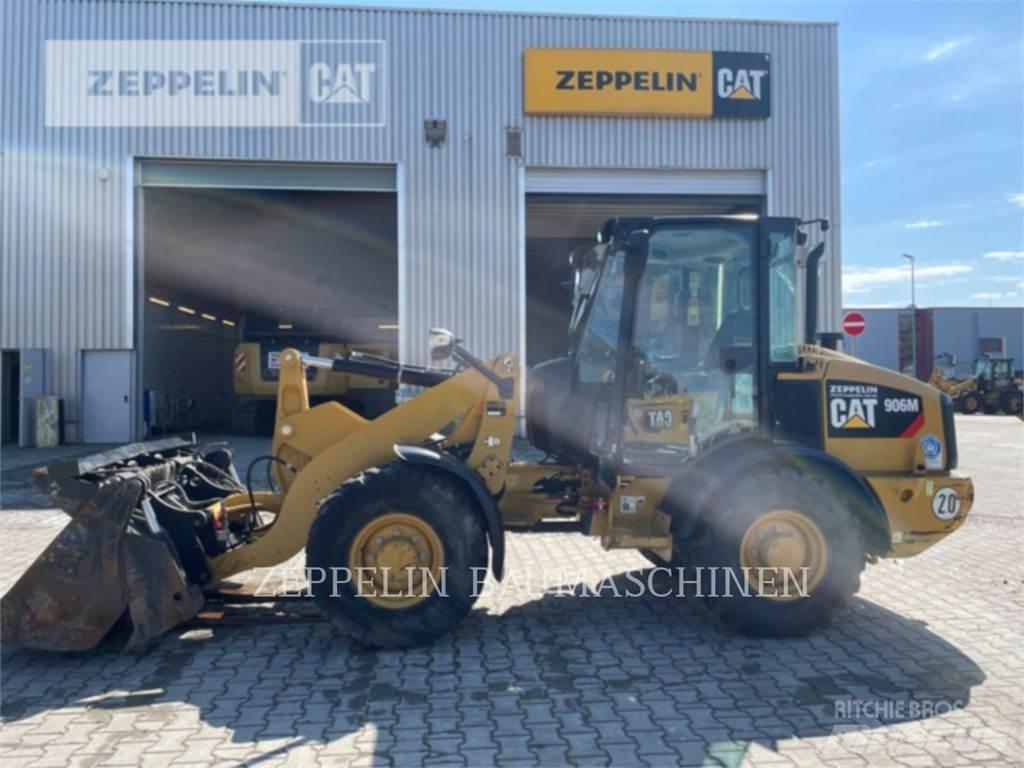 CAT 906M Iekrāvēji uz riteņiem