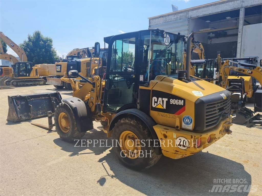 CAT 906M Iekrāvēji uz riteņiem