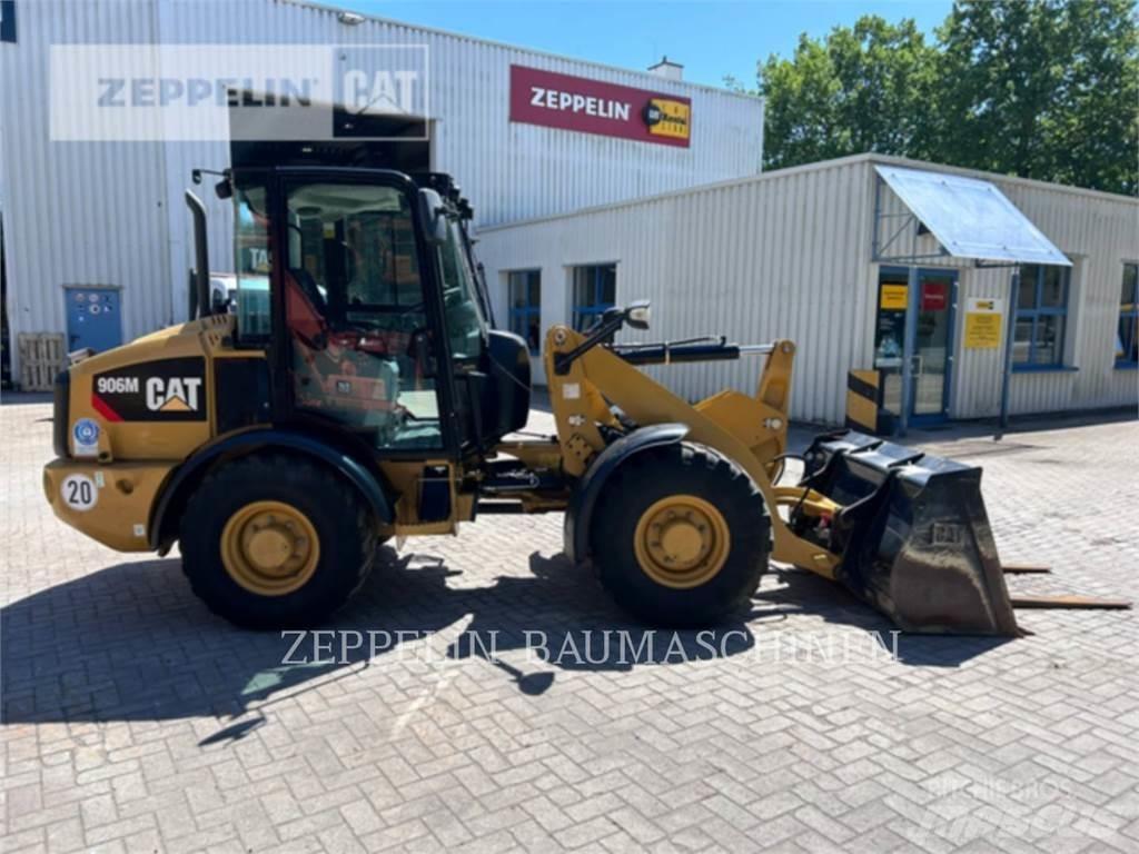 CAT 906M Iekrāvēji uz riteņiem
