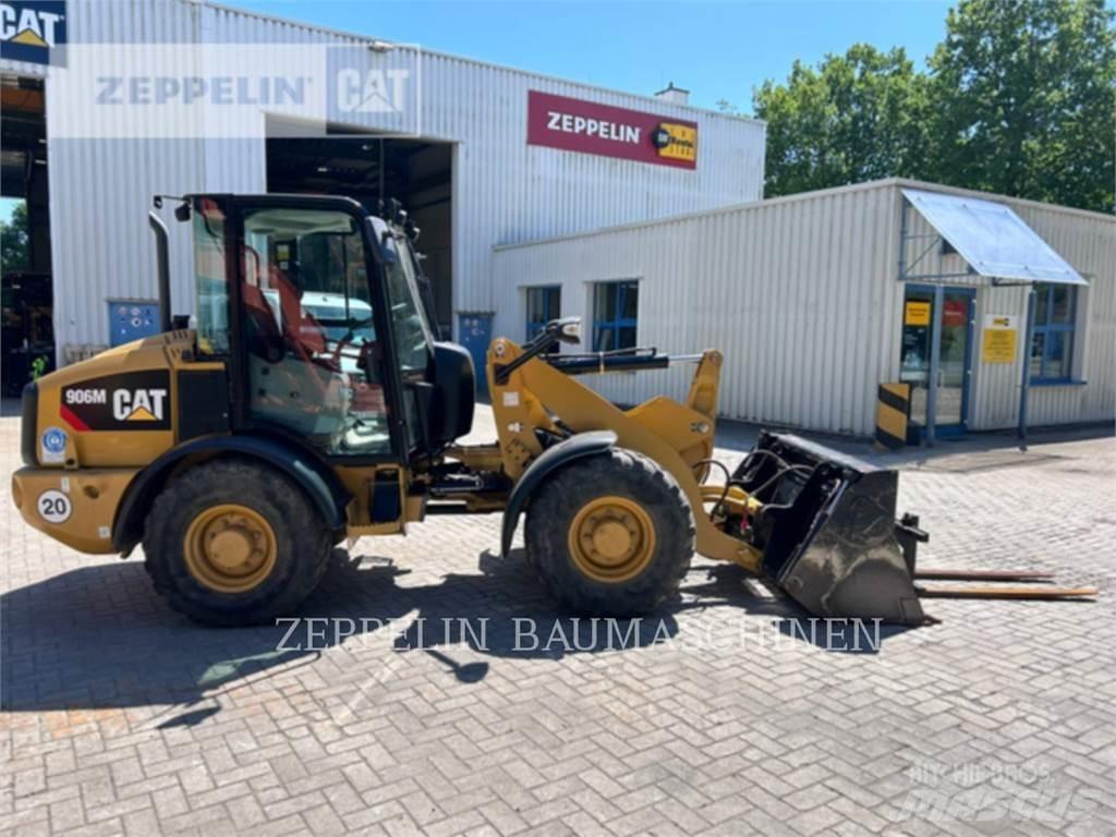 CAT 906M Iekrāvēji uz riteņiem