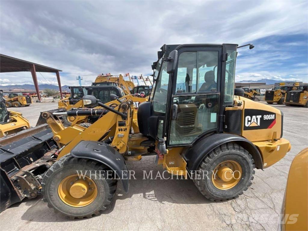 CAT 906M Iekrāvēji uz riteņiem