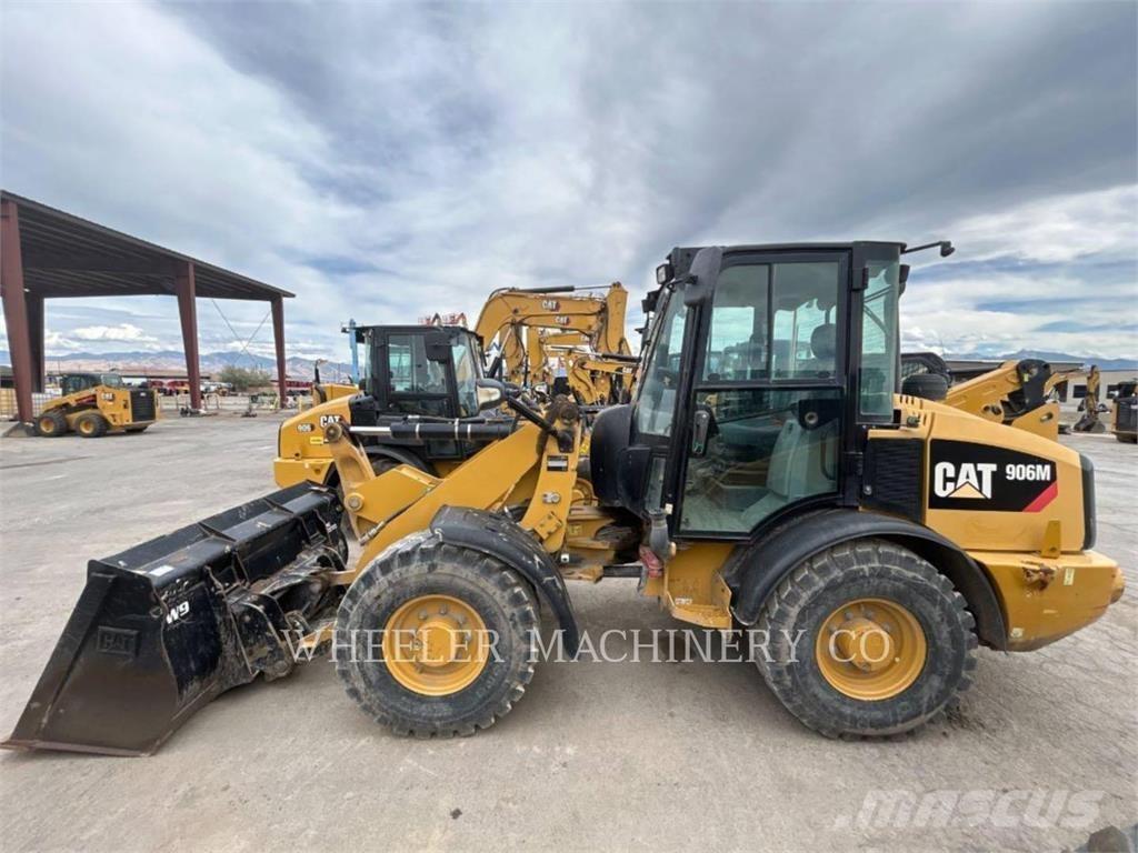 CAT 906M Iekrāvēji uz riteņiem