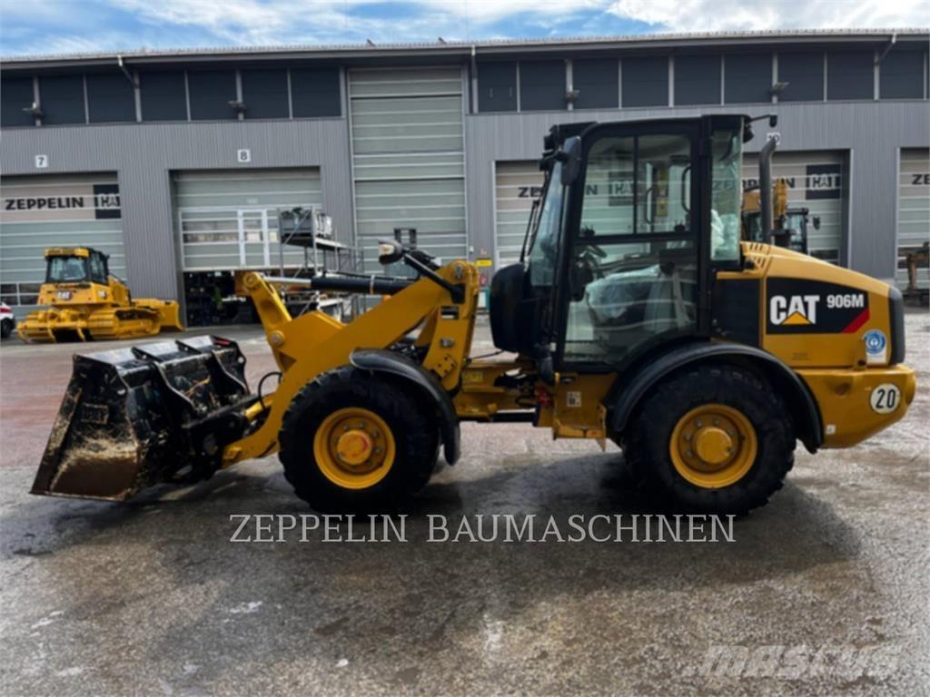 CAT 906M Iekrāvēji uz riteņiem