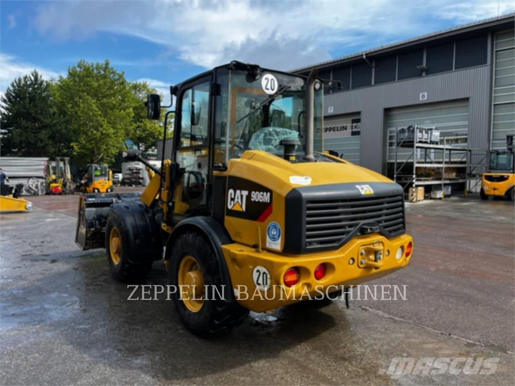 CAT 906M Iekrāvēji uz riteņiem