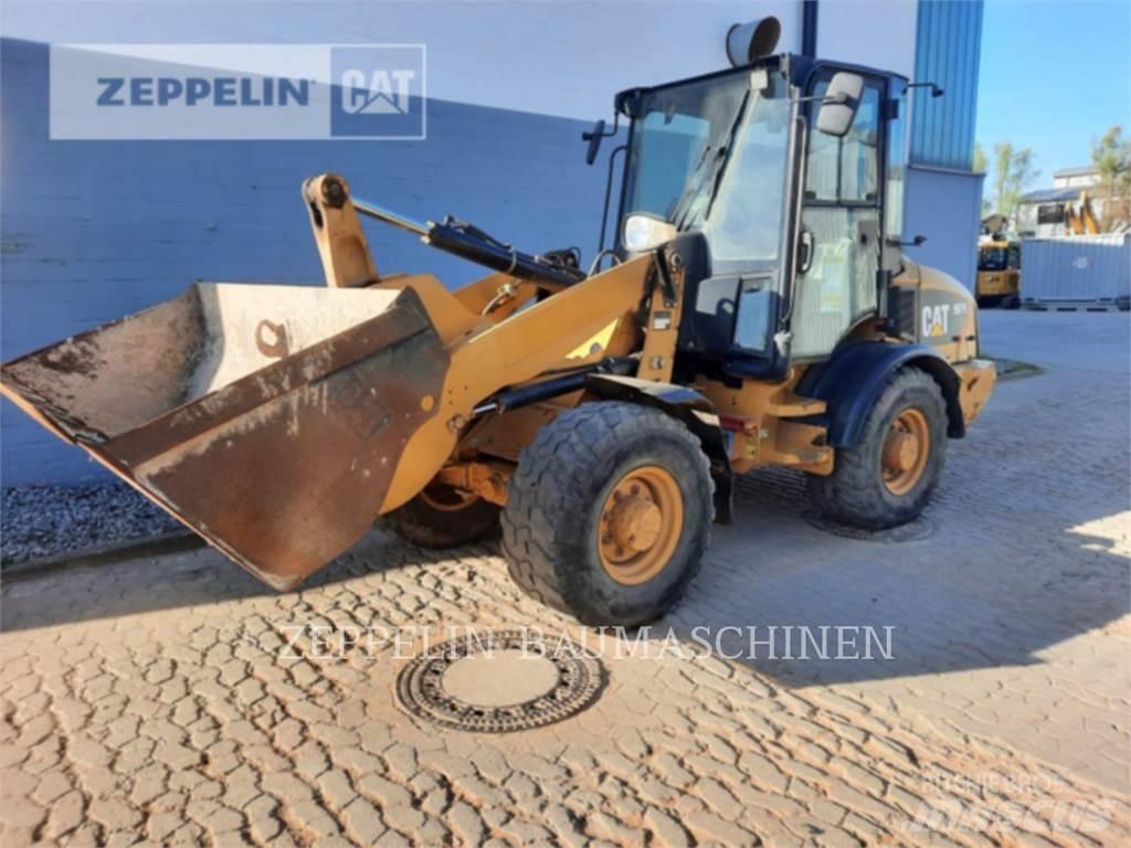 CAT 907H Iekrāvēji uz riteņiem