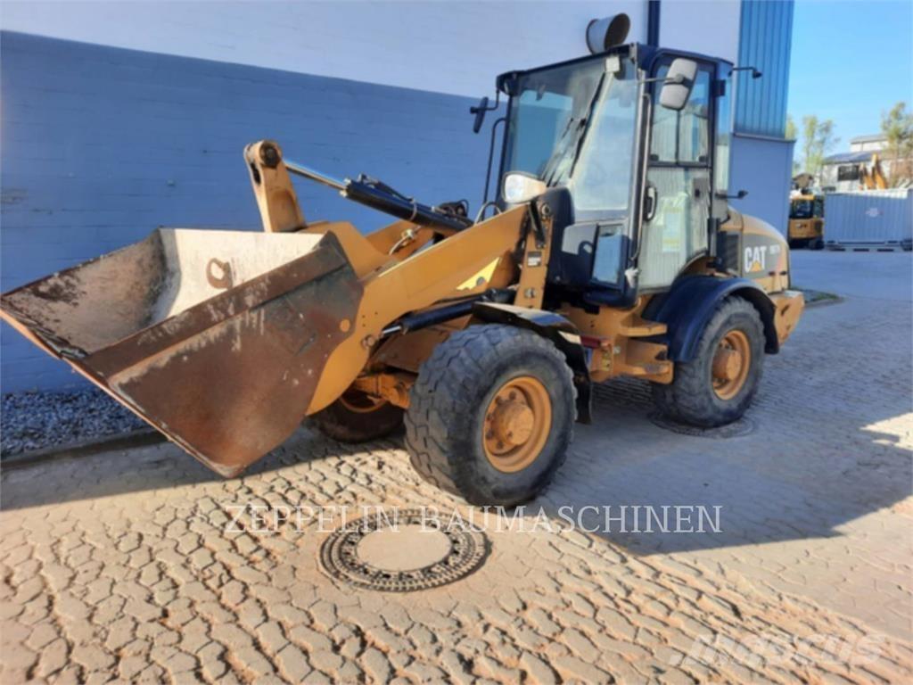 CAT 907H Iekrāvēji uz riteņiem