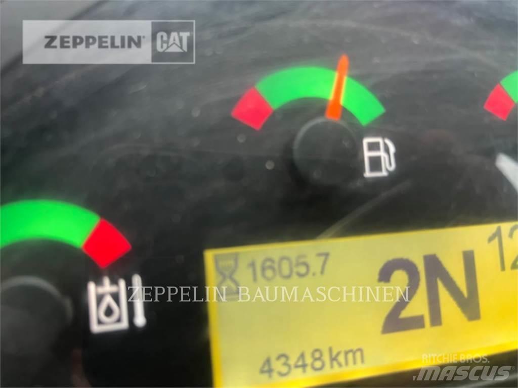 CAT 907M Iekrāvēji uz riteņiem