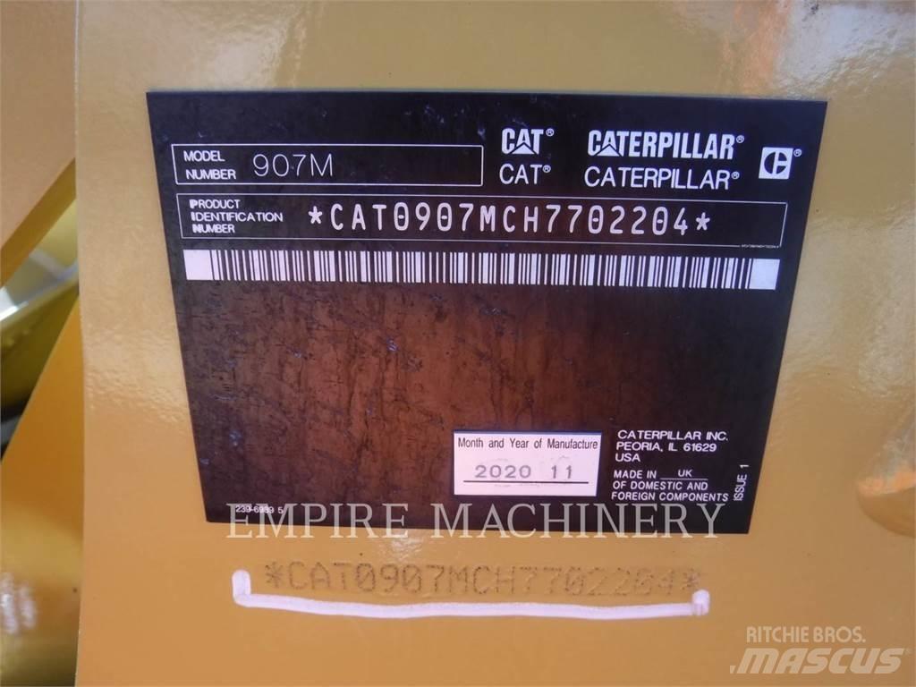 CAT 907M Iekrāvēji uz riteņiem