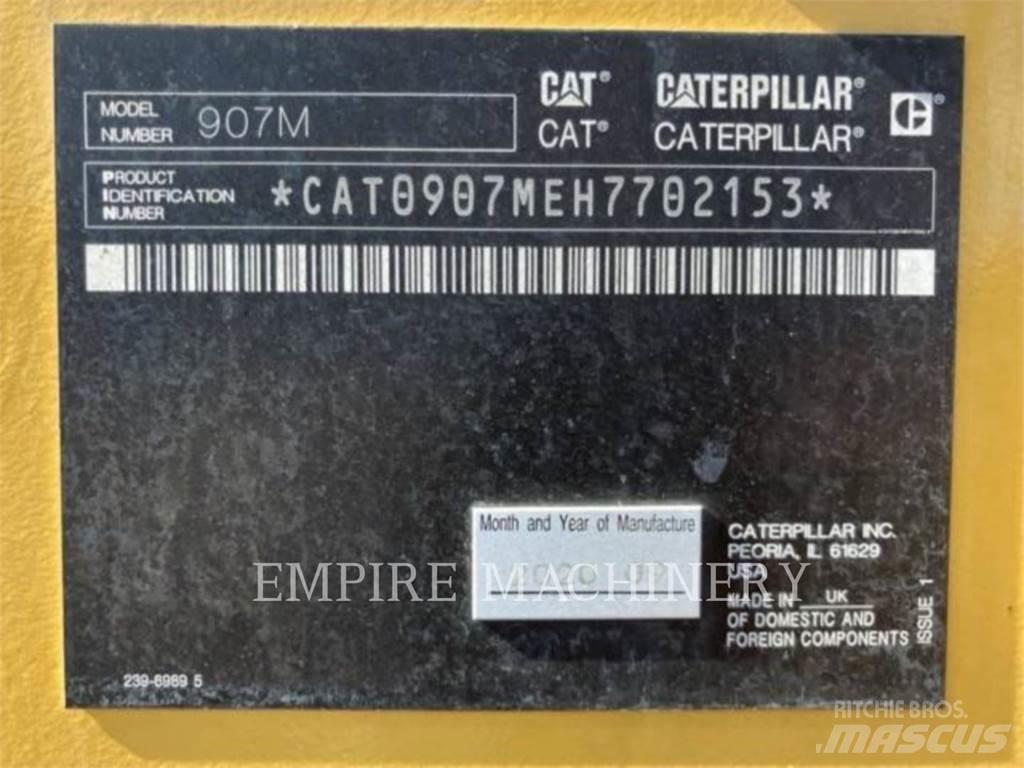 CAT 907M Iekrāvēji uz riteņiem