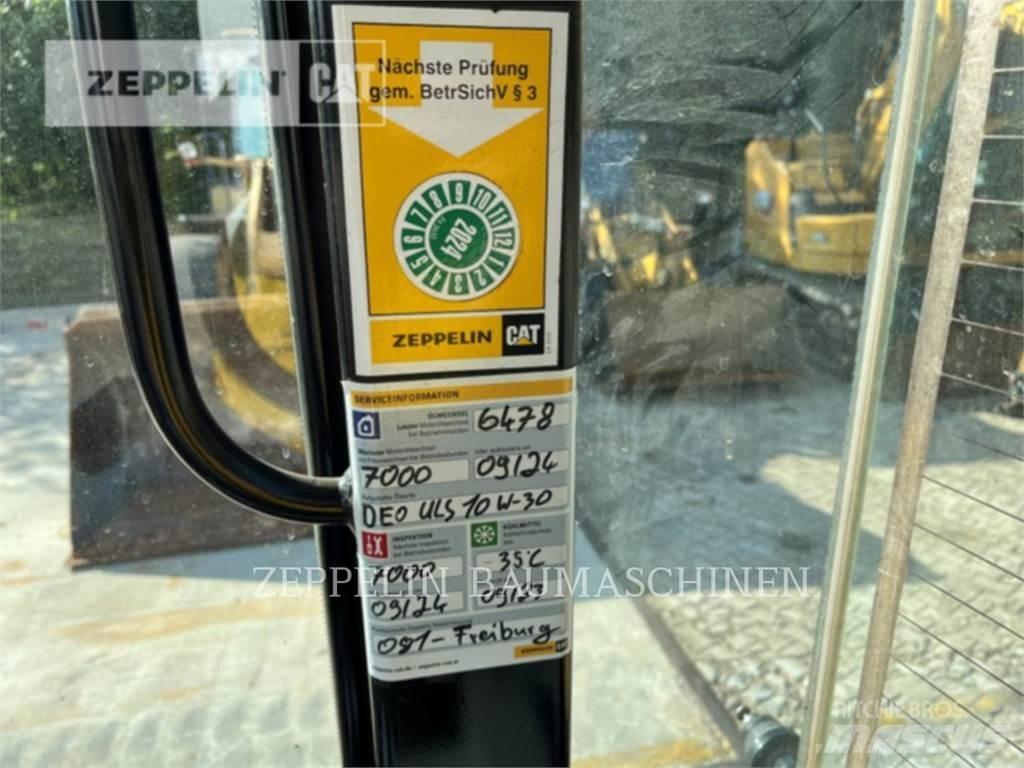 CAT 907M Iekrāvēji uz riteņiem