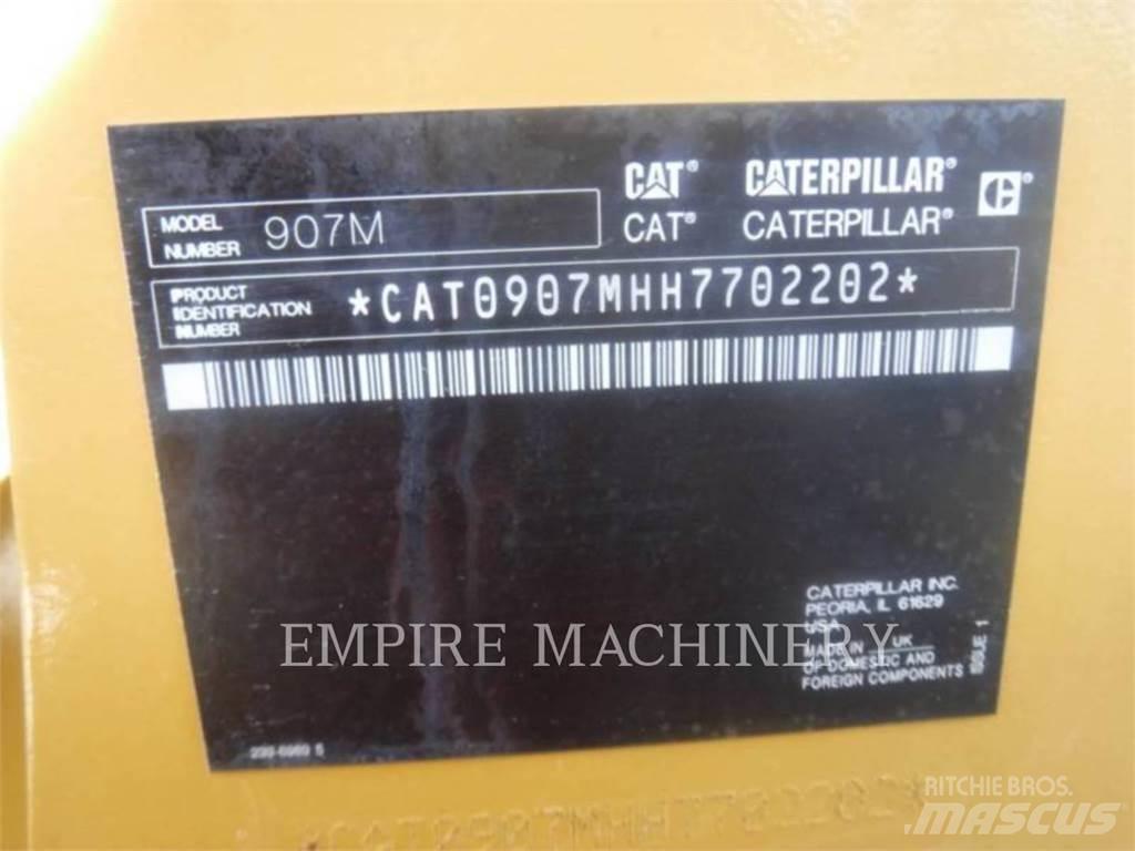 CAT 907M Iekrāvēji uz riteņiem