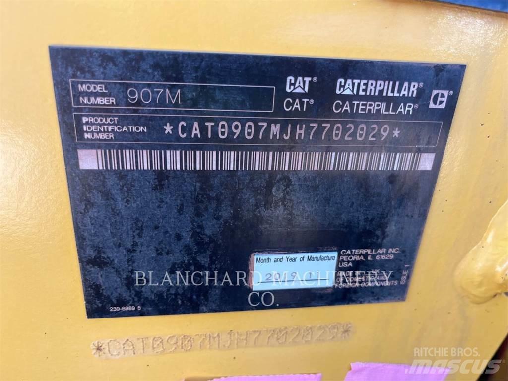 CAT 907M Iekrāvēji uz riteņiem