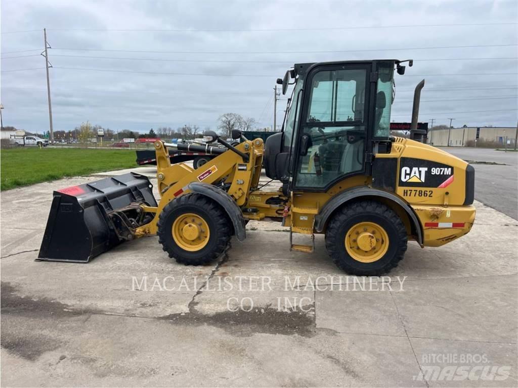 CAT 907M Iekrāvēji uz riteņiem