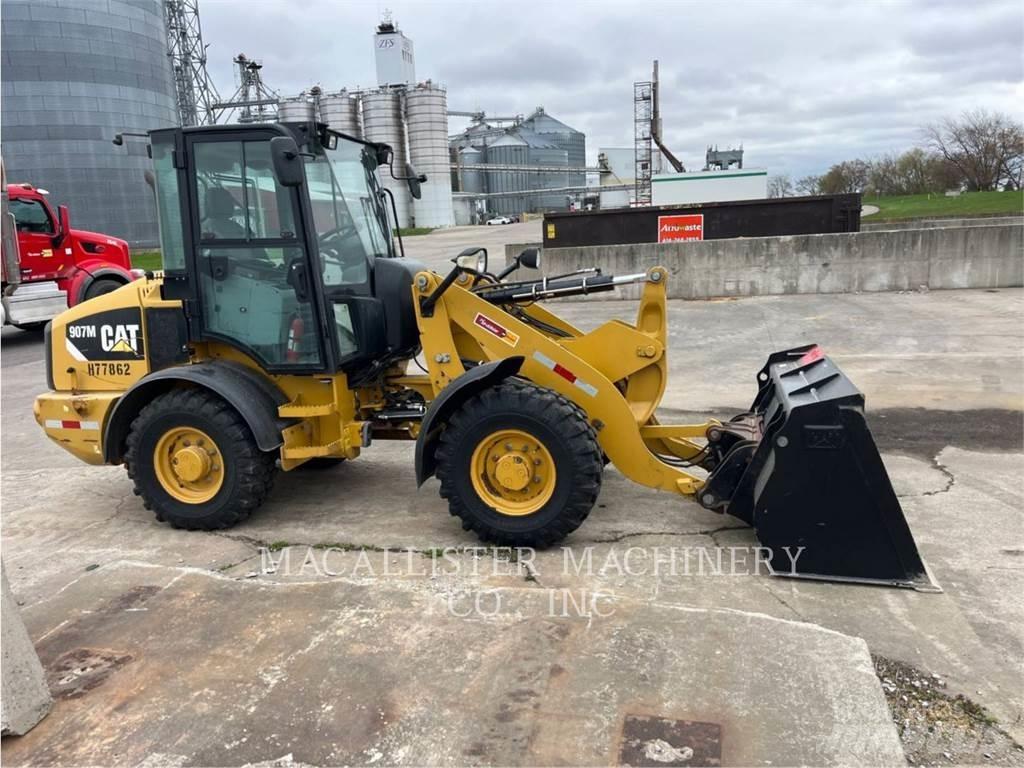 CAT 907M Iekrāvēji uz riteņiem