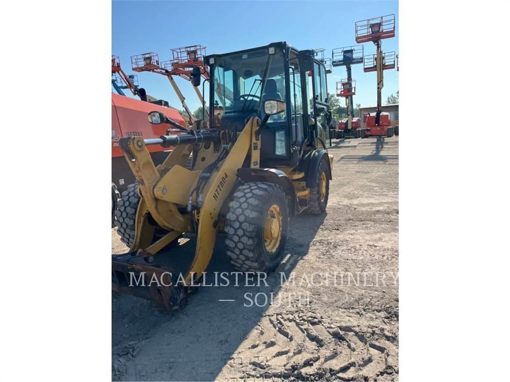 CAT 907M Iekrāvēji uz riteņiem