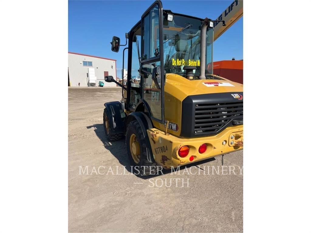 CAT 907M Iekrāvēji uz riteņiem