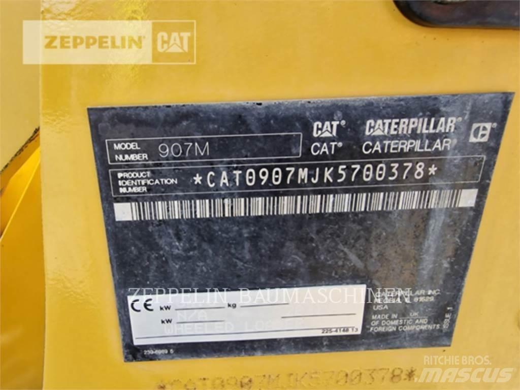 CAT 907M Iekrāvēji uz riteņiem