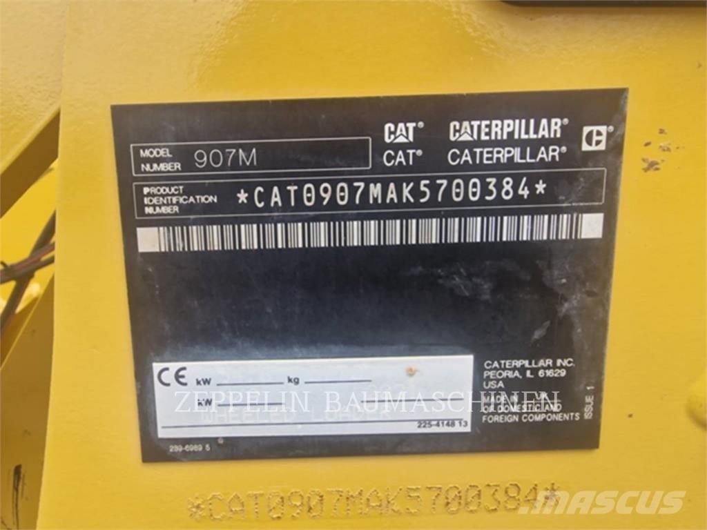 CAT 907M Iekrāvēji uz riteņiem