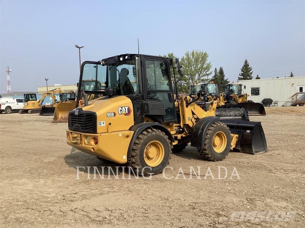 CAT 908 Iekrāvēji uz riteņiem