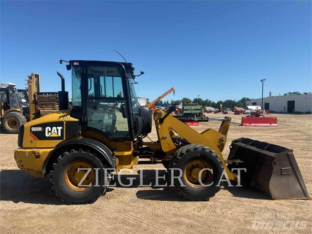 CAT 908H2 Iekrāvēji uz riteņiem