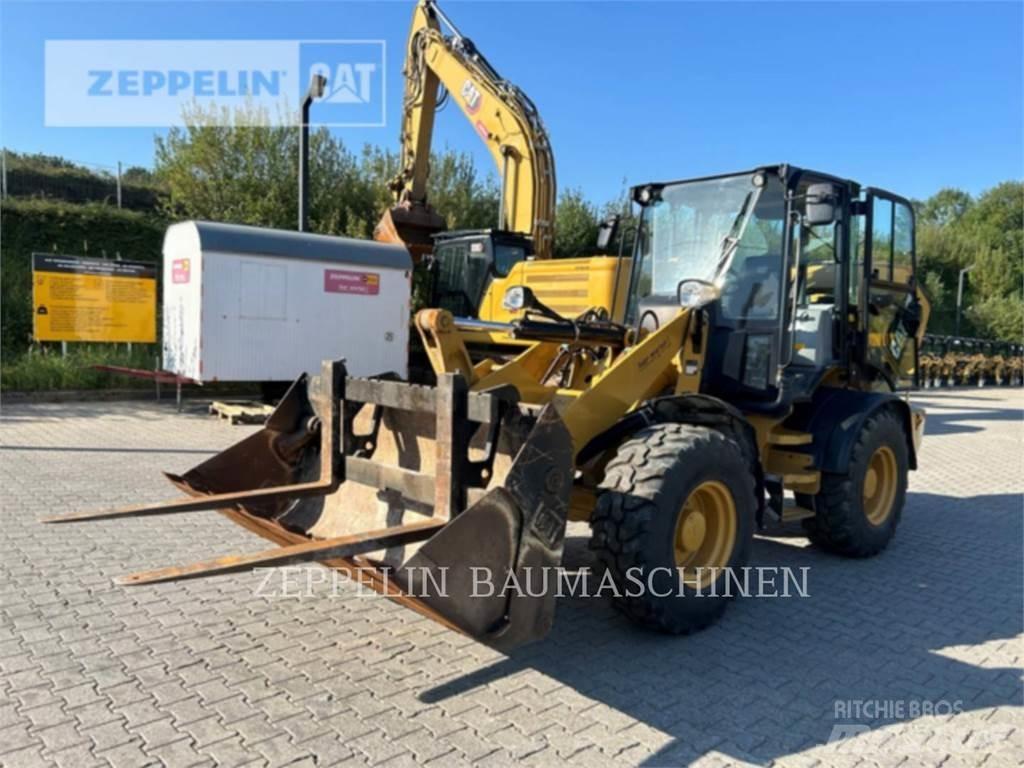 CAT 908M Iekrāvēji uz riteņiem