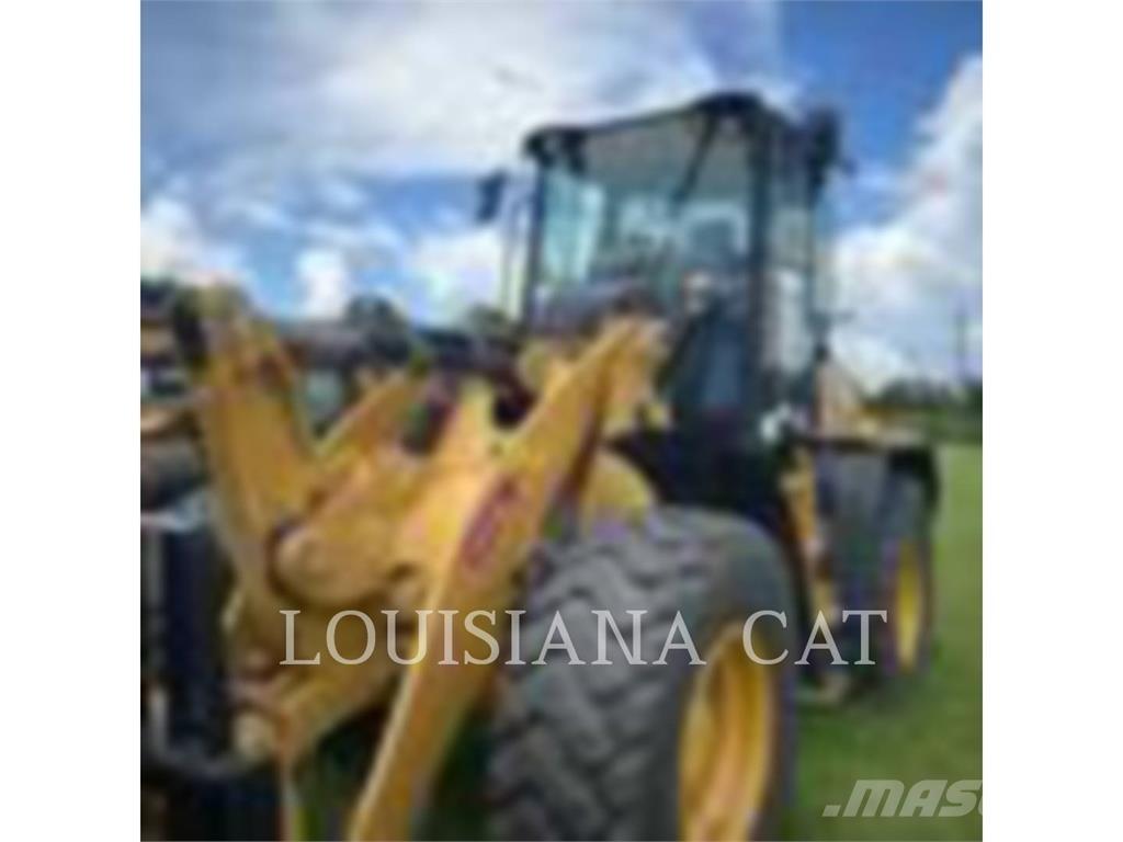 CAT 910 Iekrāvēji uz riteņiem