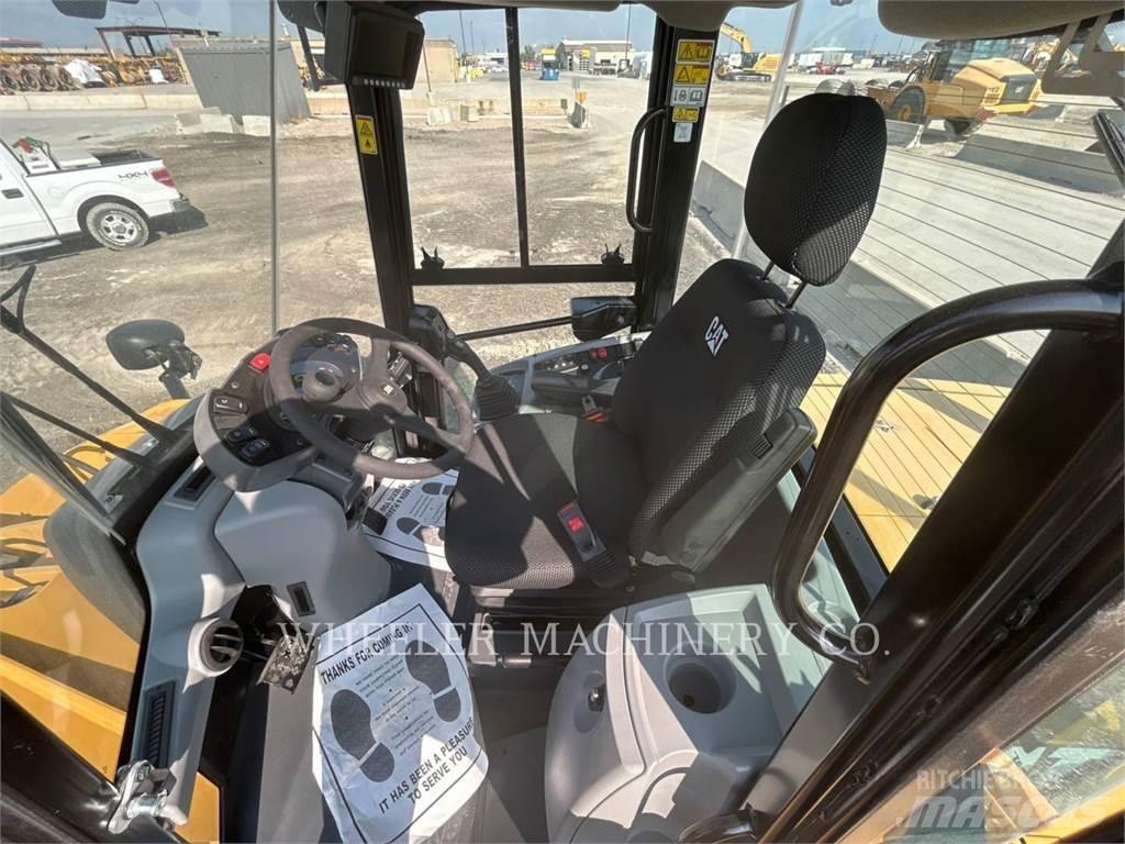 CAT 910 Iekrāvēji uz riteņiem