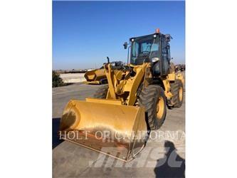 CAT 910M Iekrāvēji uz riteņiem
