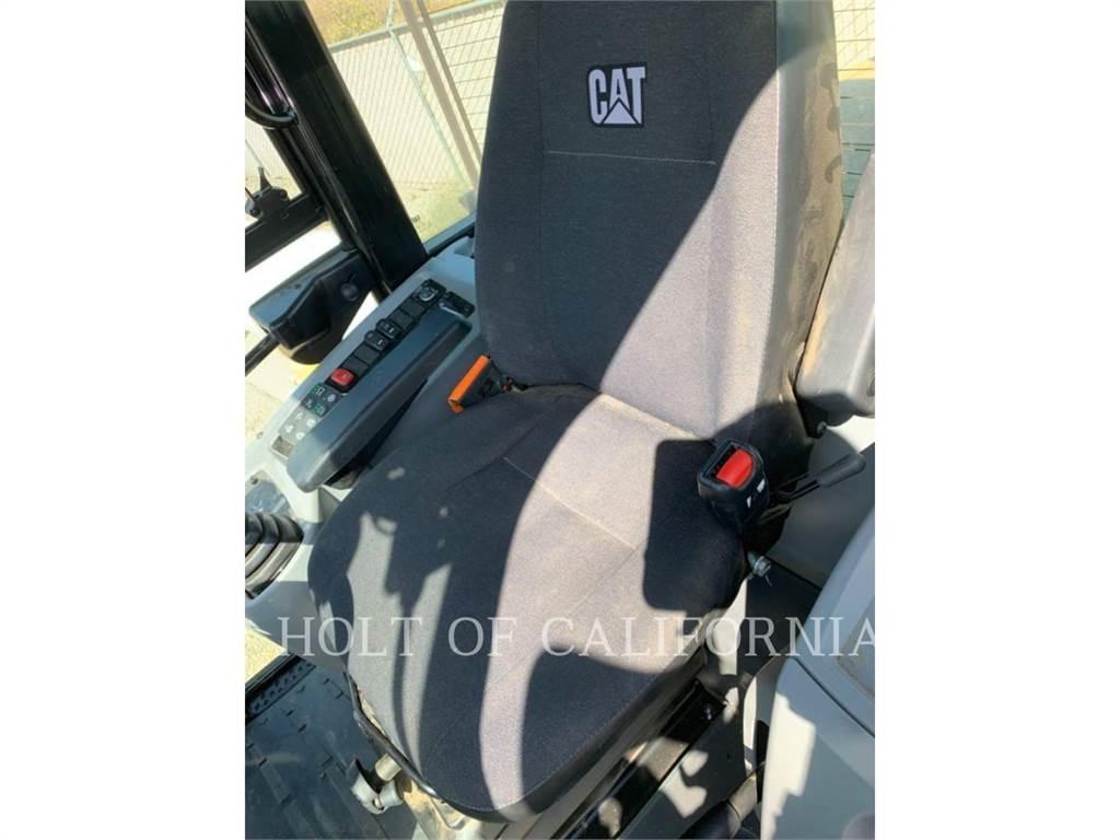 CAT 910M Iekrāvēji uz riteņiem