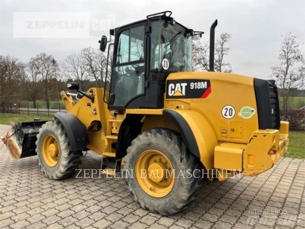 CAT 918M Iekrāvēji uz riteņiem