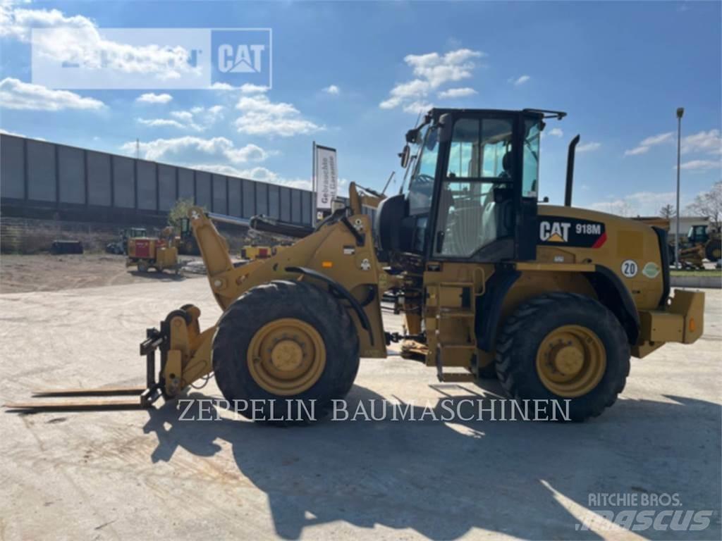 CAT 918M Iekrāvēji uz riteņiem