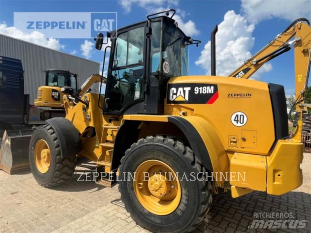 CAT 918M Iekrāvēji uz riteņiem