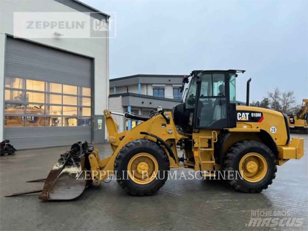 CAT 918M Iekrāvēji uz riteņiem