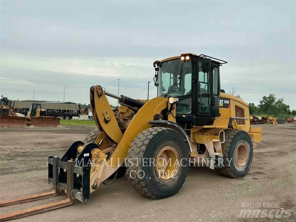 CAT 930M Iekrāvēji uz riteņiem