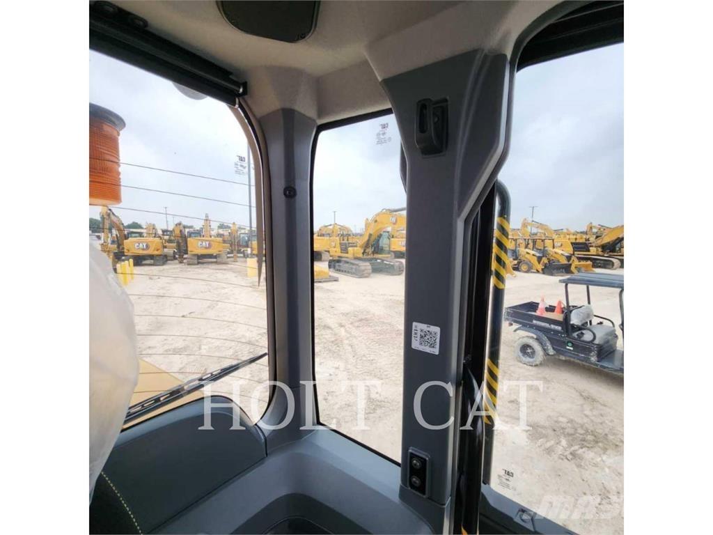 CAT 938 QC Iekrāvēji uz riteņiem
