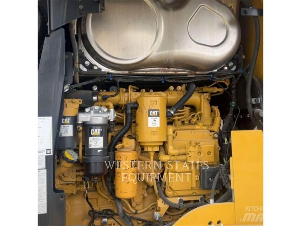 CAT 938M Iekrāvēji uz riteņiem