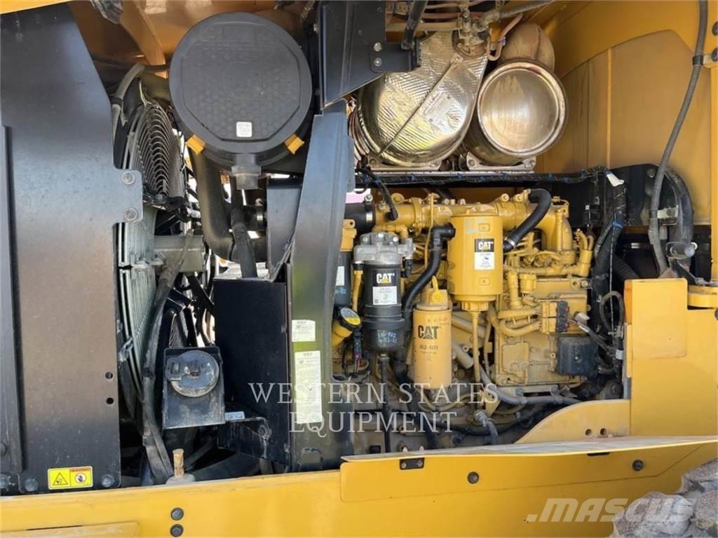 CAT 938M Iekrāvēji uz riteņiem