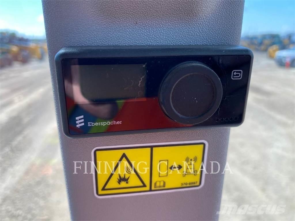 CAT 938M Iekrāvēji uz riteņiem