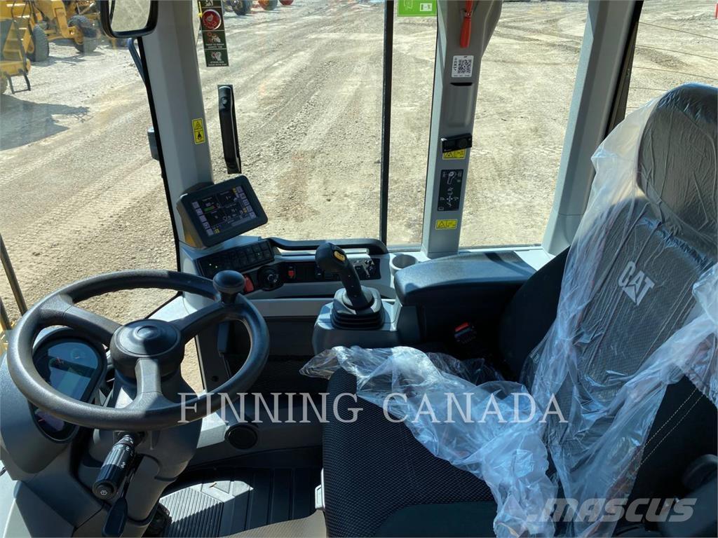 CAT 938M Iekrāvēji uz riteņiem