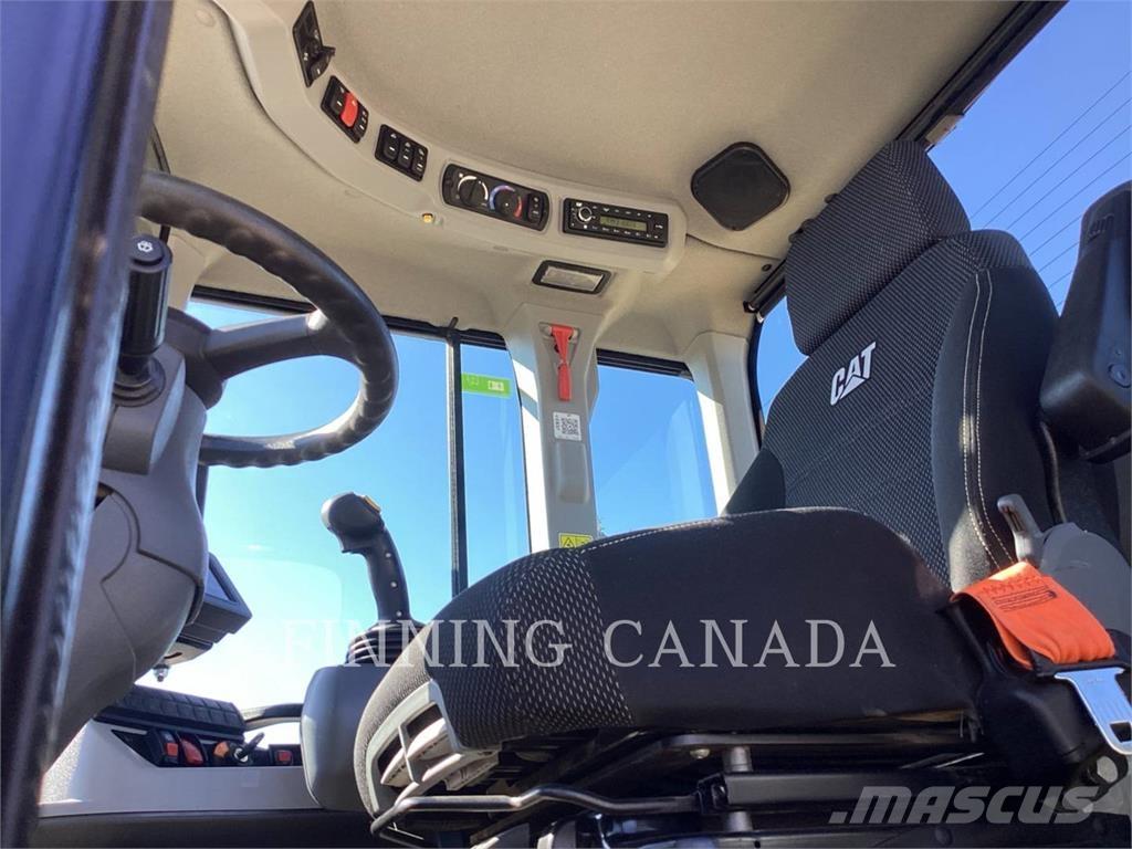 CAT 938M Iekrāvēji uz riteņiem