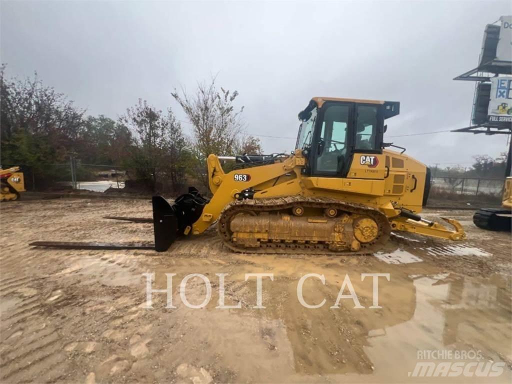 CAT 963 Iekrāvēji uz riteņiem