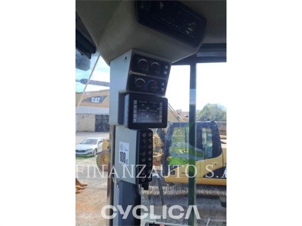CAT 966M Iekrāvēji uz riteņiem