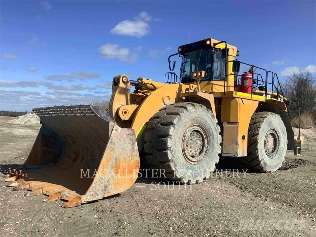 CAT 990 Iekrāvēji uz riteņiem