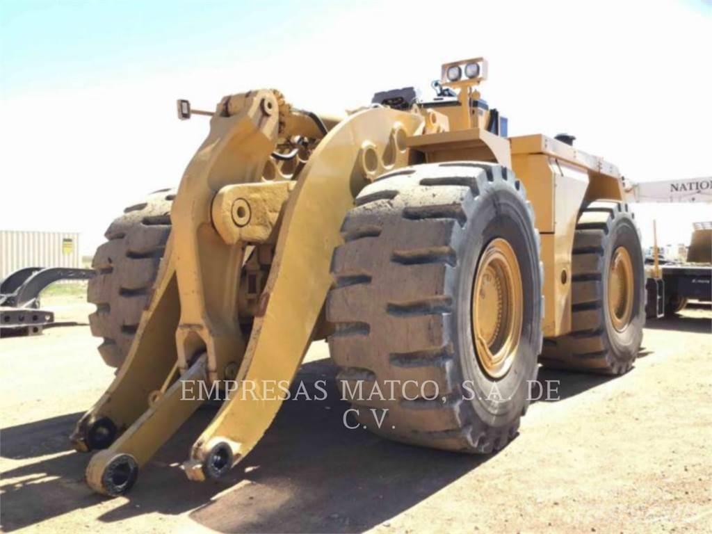 CAT 990 Iekrāvēji uz riteņiem