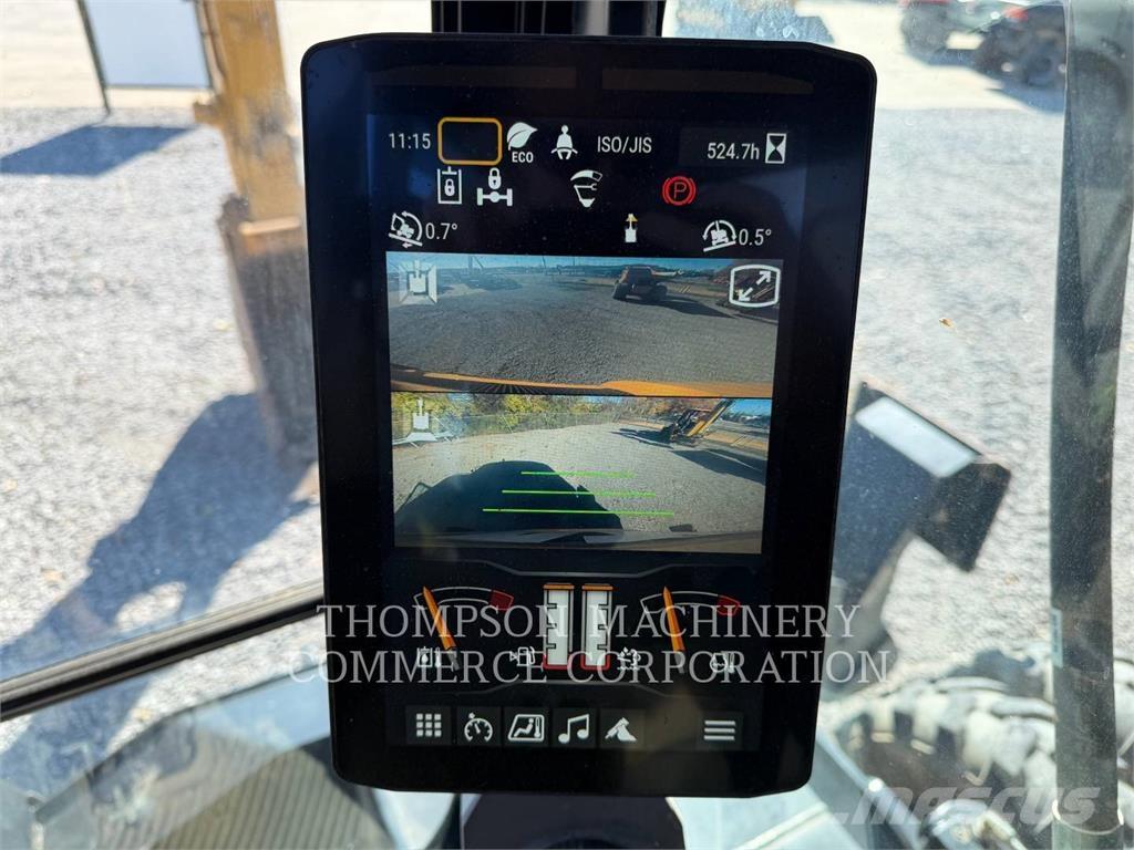 CAT M 318 Ekskavatori uz riteņiem